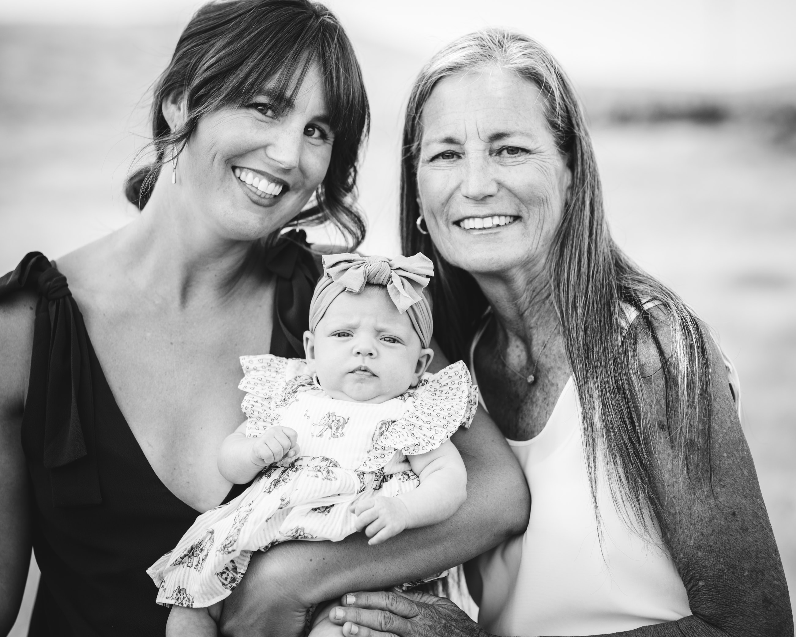 Three generations of women smiling together — Eagle Idaho family photographer