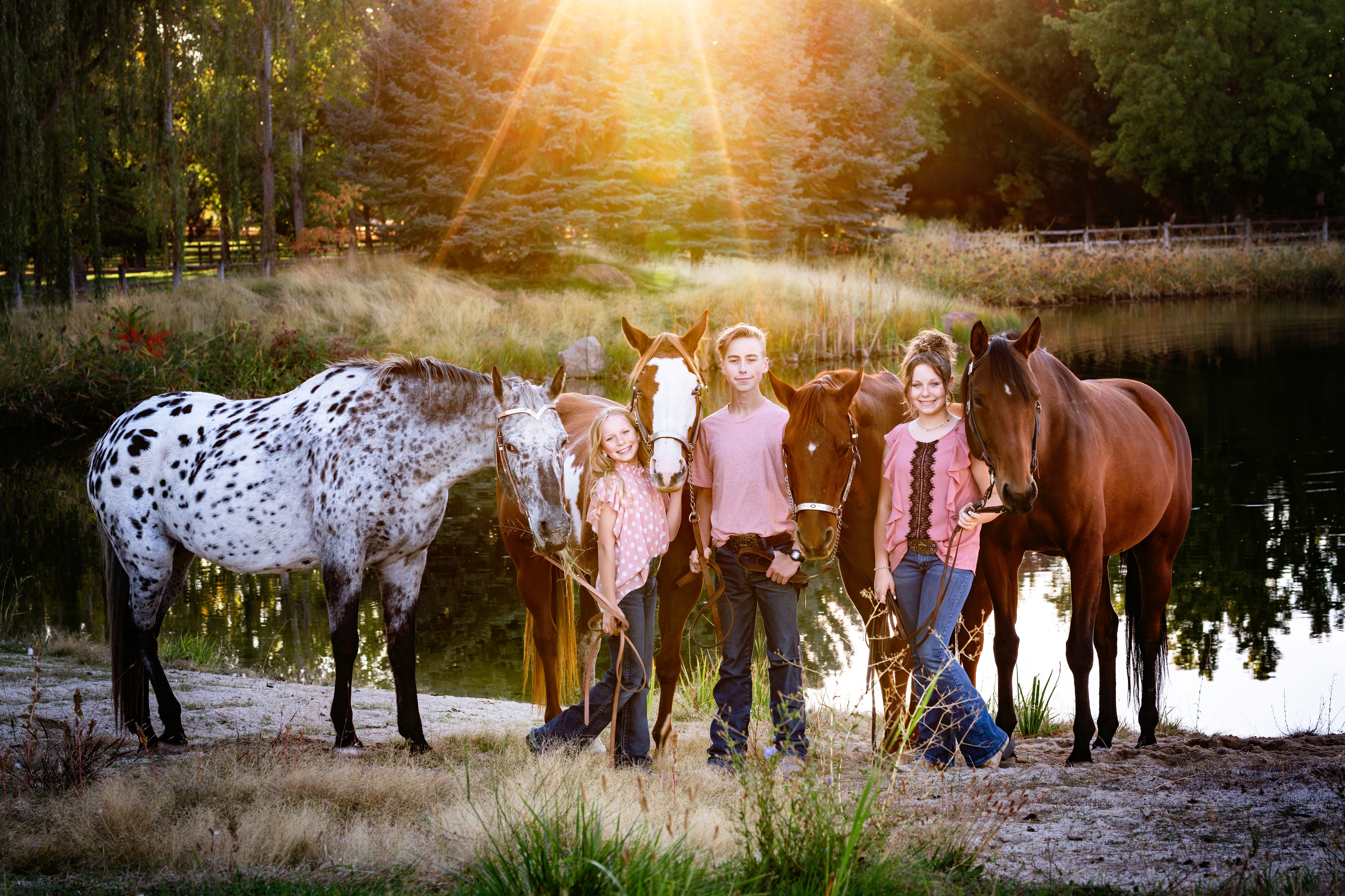 Children posing with horses by the river — Boise Idaho family portraits