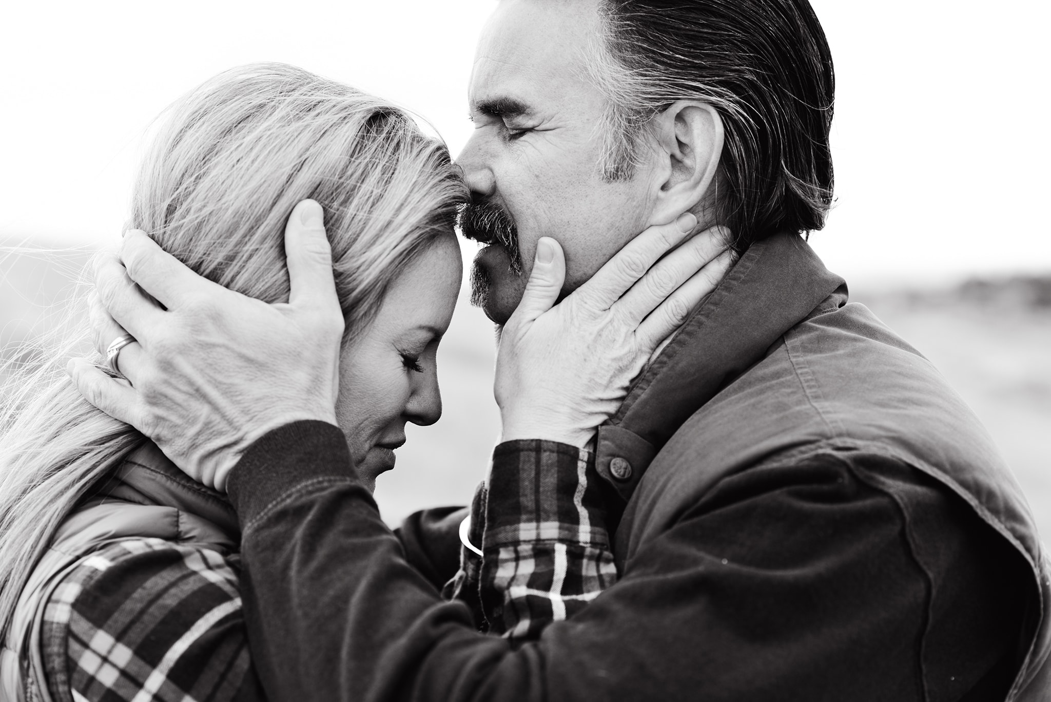 Couple kissing outdoors black and white — Eagle Idaho family portrait session