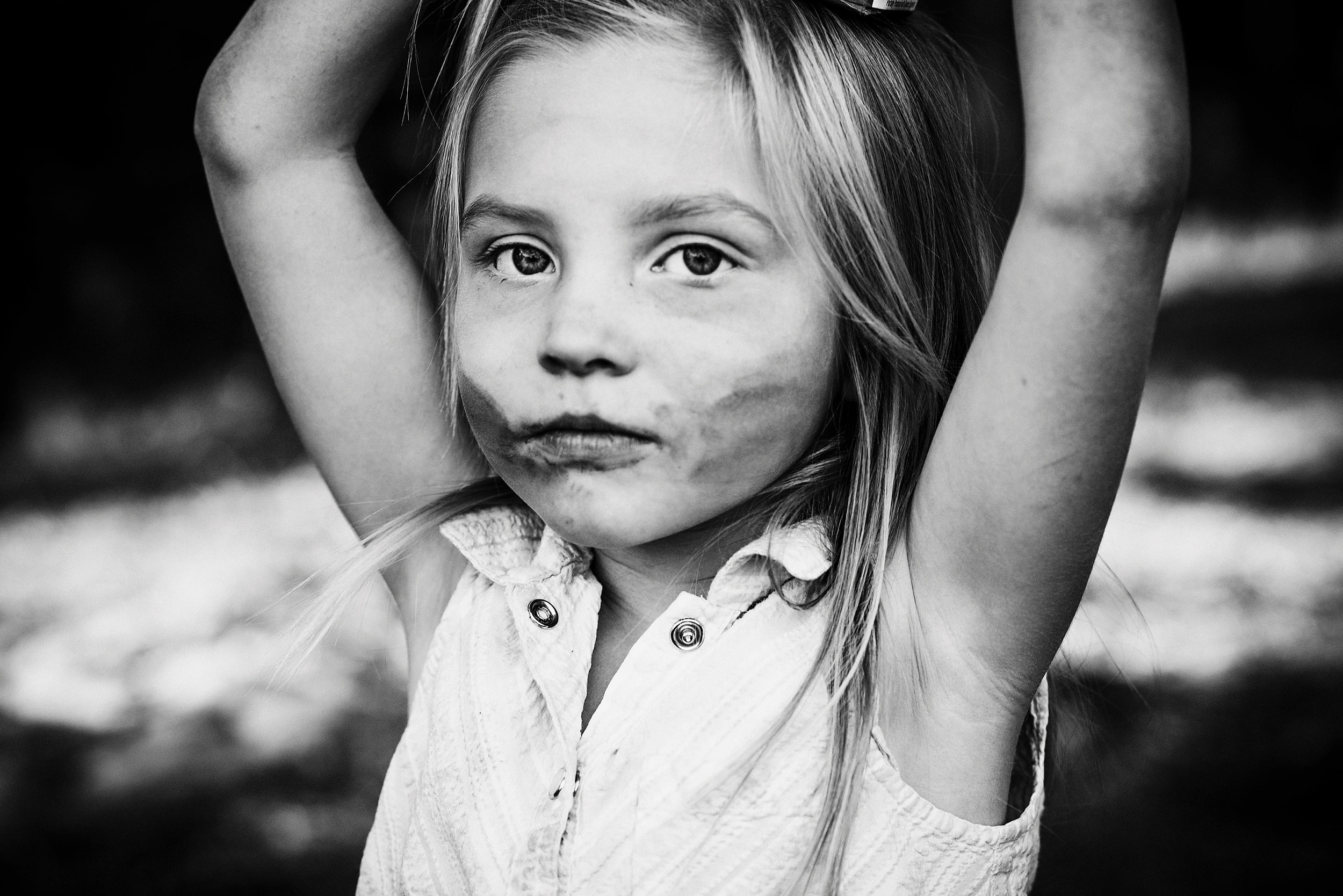 Young girl posing with arms raised — IdaHOPE portrait session Idaho