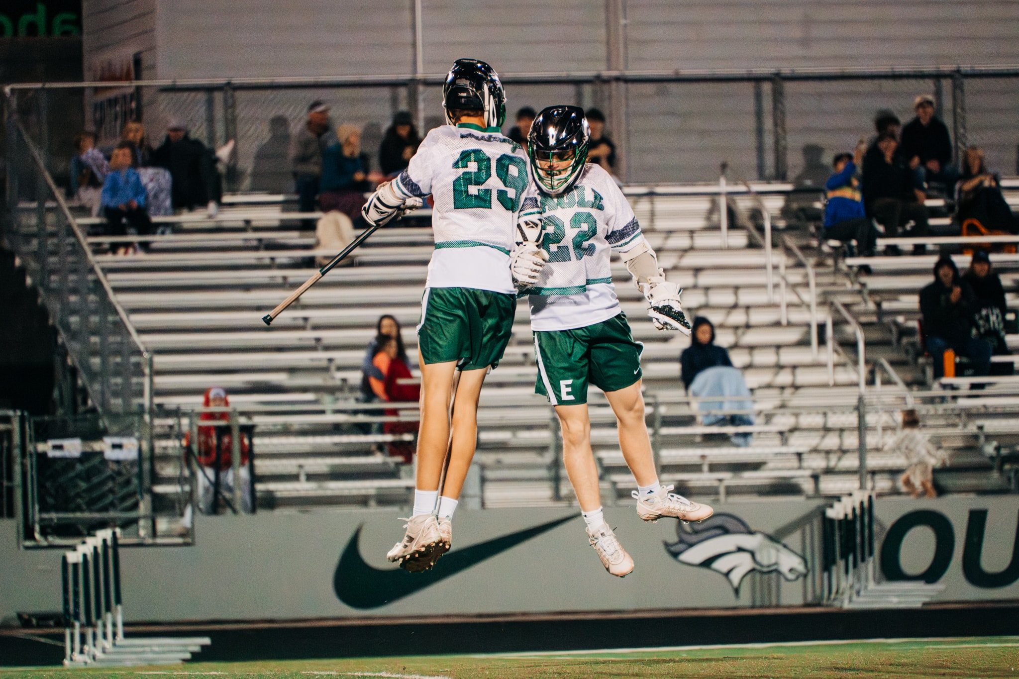 Lacrosse players celebrating goal — Treasure Valley sports action photography