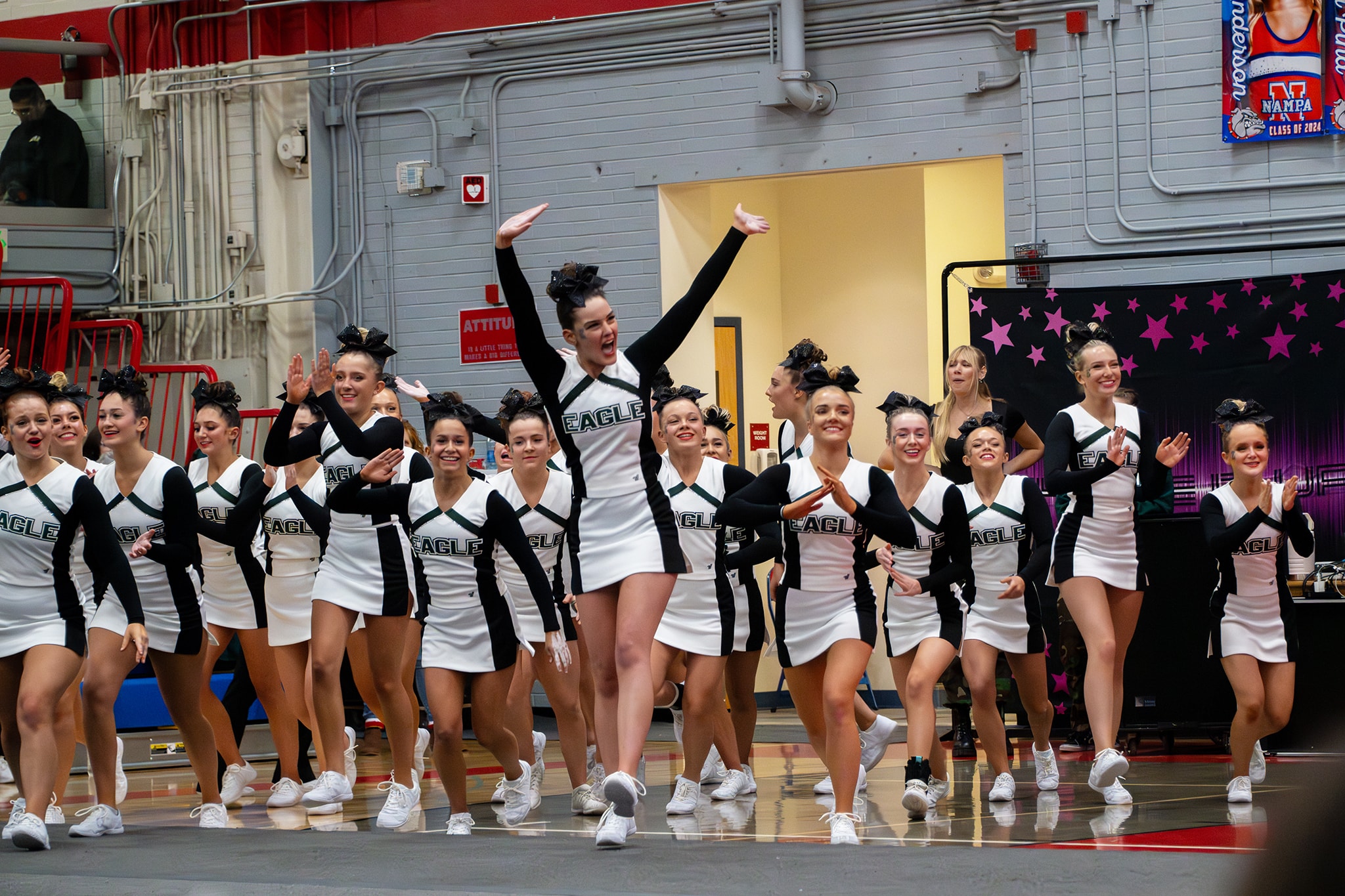 Cheerleaders performing routine at gymnasium — Eagle Idaho sports photographer