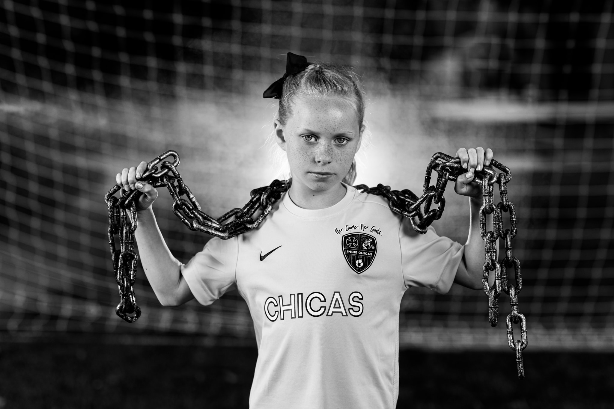 Young girl soccer portrait holding chains — individual athlete portrait Treasure Valley