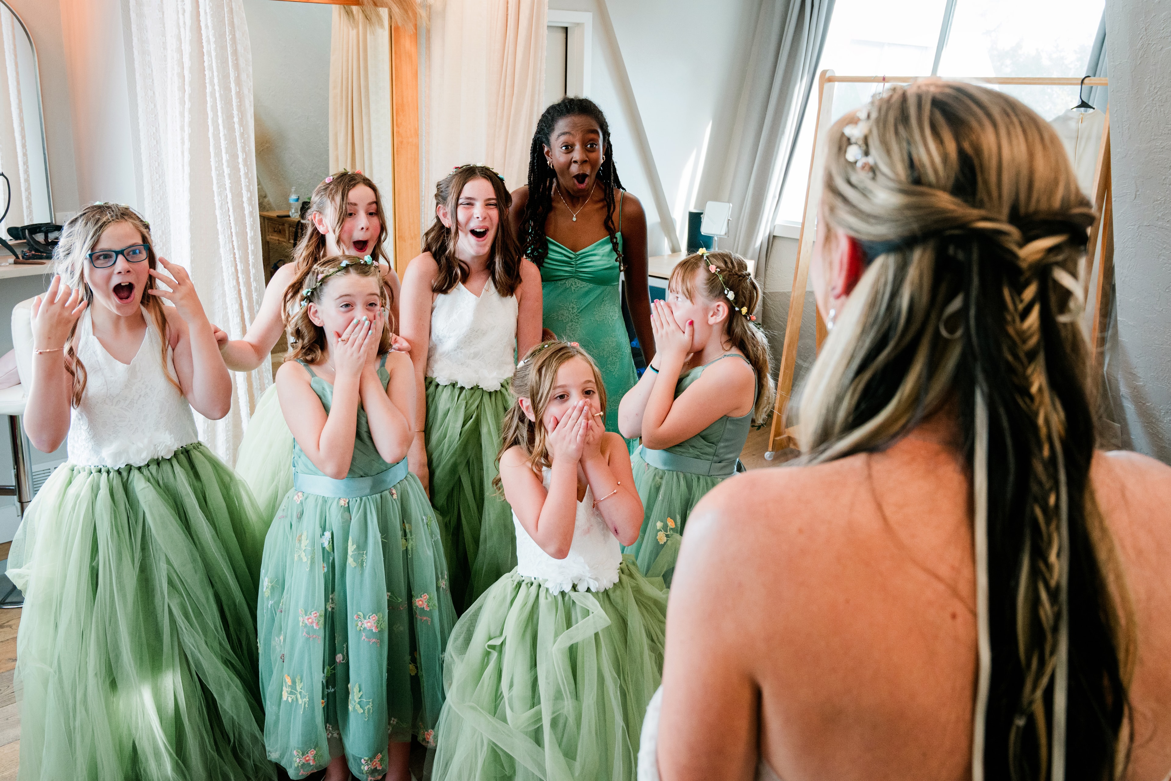Children in green tutus surprised by bride — Idaho wedding photography