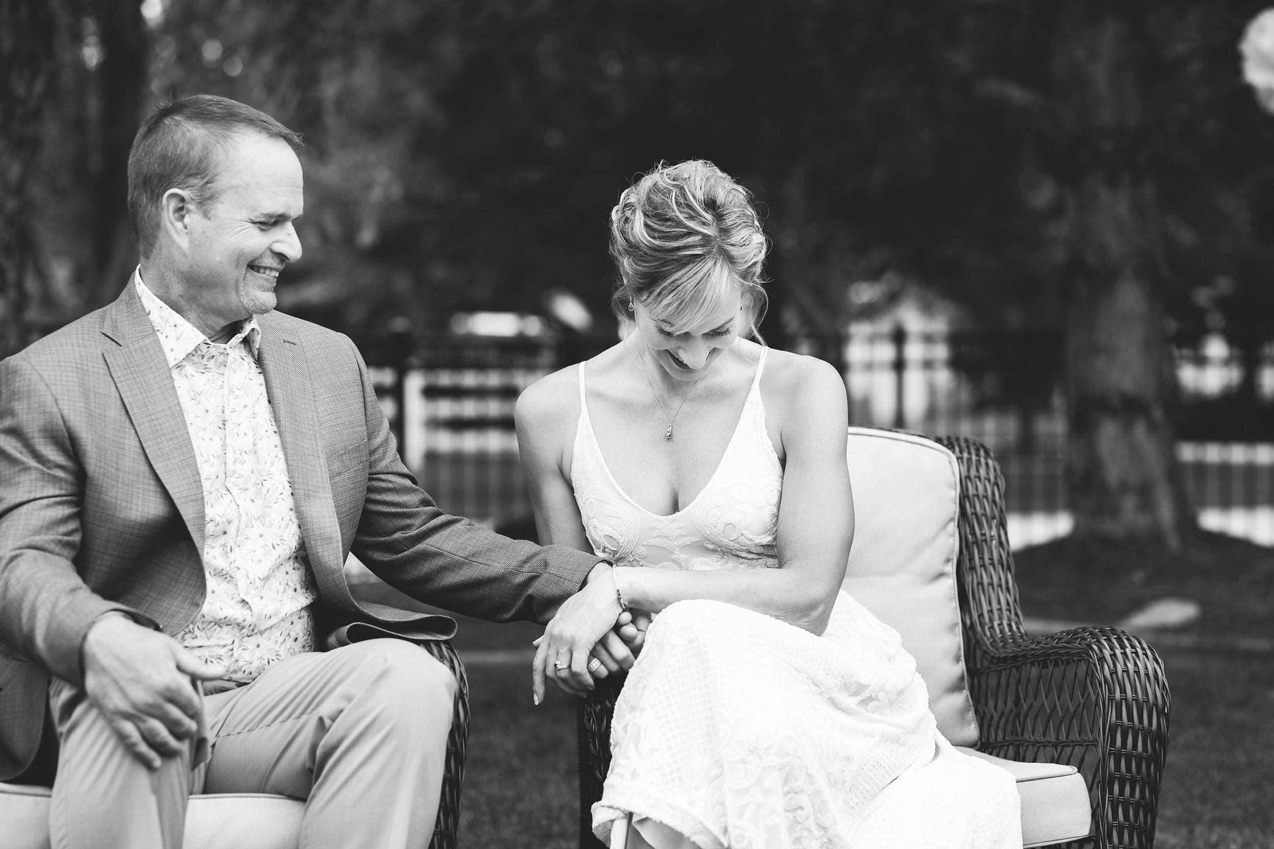 Bride and groom sitting together outdoors — Chrissy Ray Photography Eagle Idaho