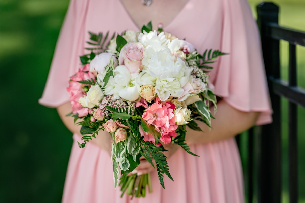 Bride holding pink and white floral bouquet — Idaho wedding photography