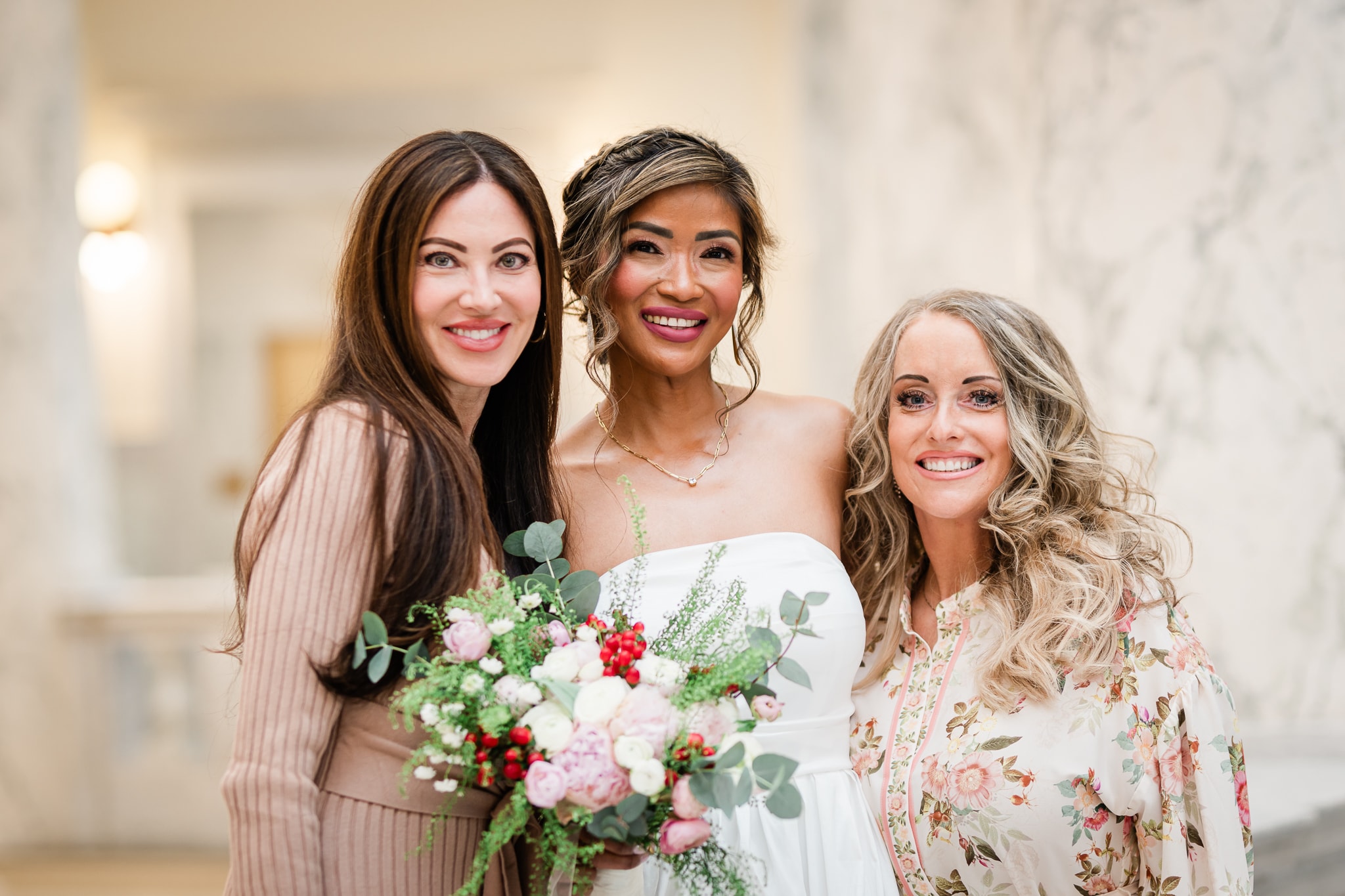 Bride and bridesmaids holding wedding bouquet — Eagle Idaho