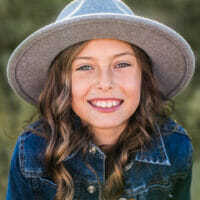 Portrait of girl in a hat by Chrissy Ray – Photographer in the Treasure Valley