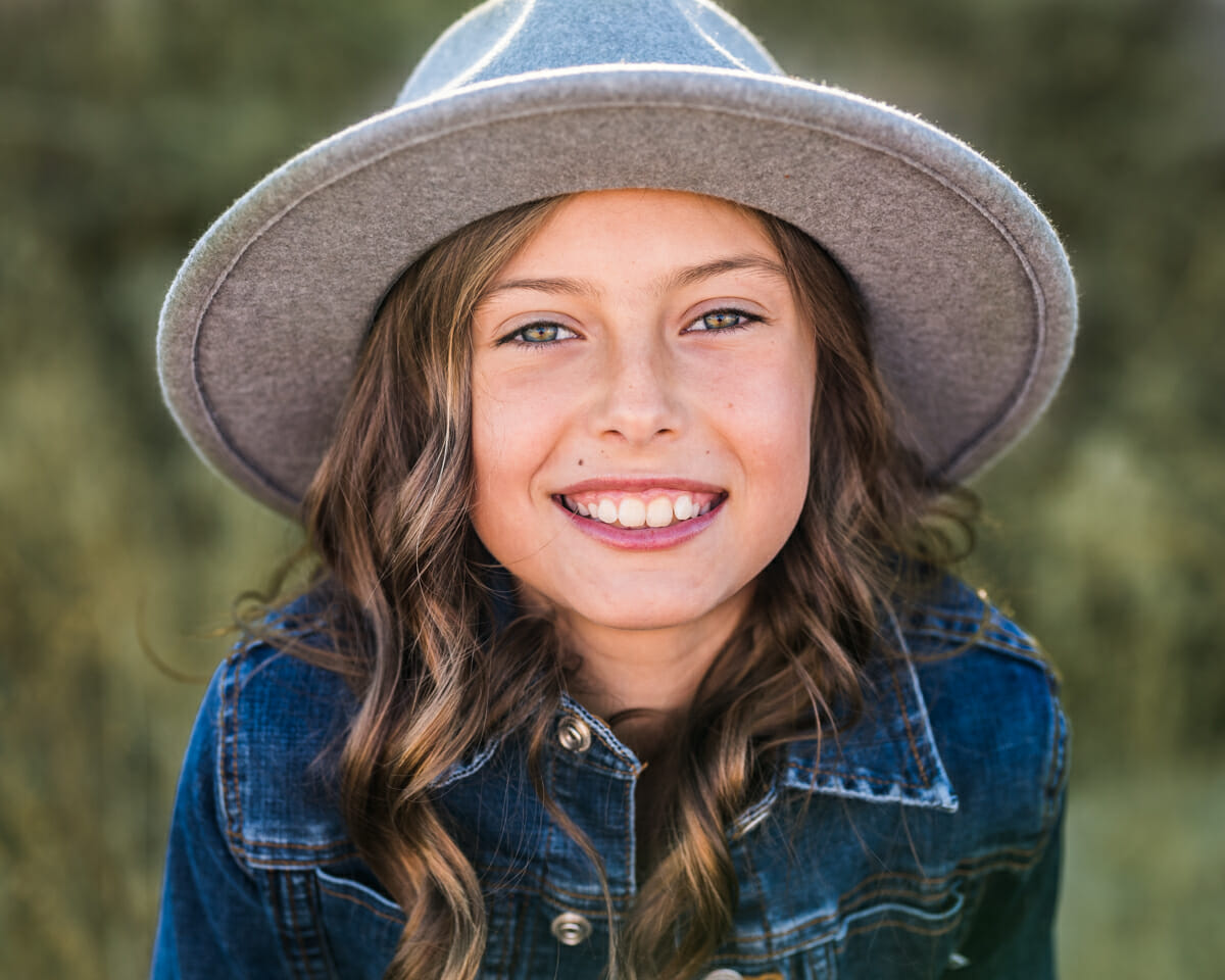 Portrait of girl in a hat by Chrissy Ray – Photographer in the Treasure Valley