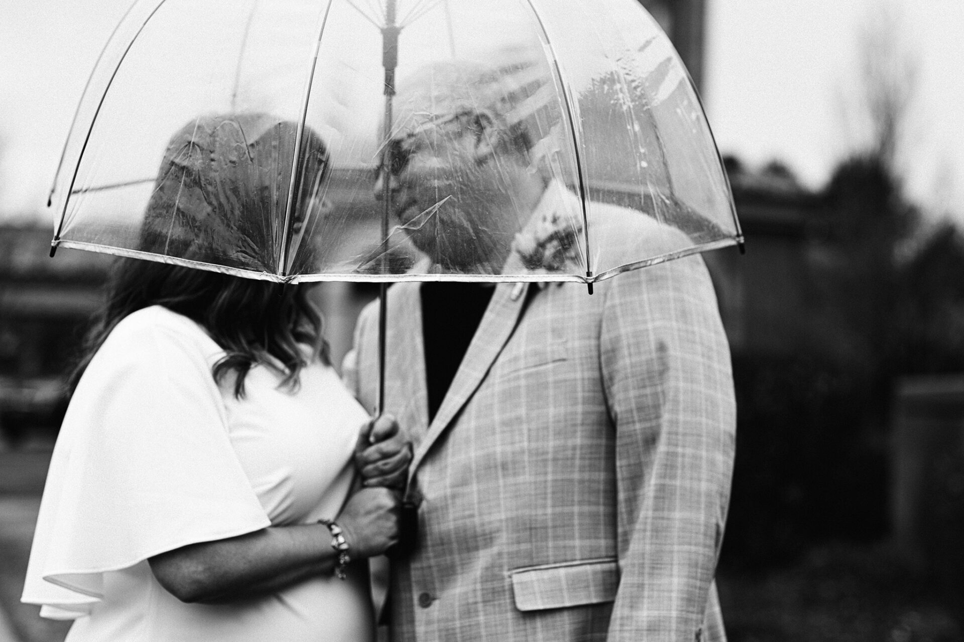 Wedding portrait in black and white under an umbrella by Chrissy Ray – Photographer in the Treasure Valley